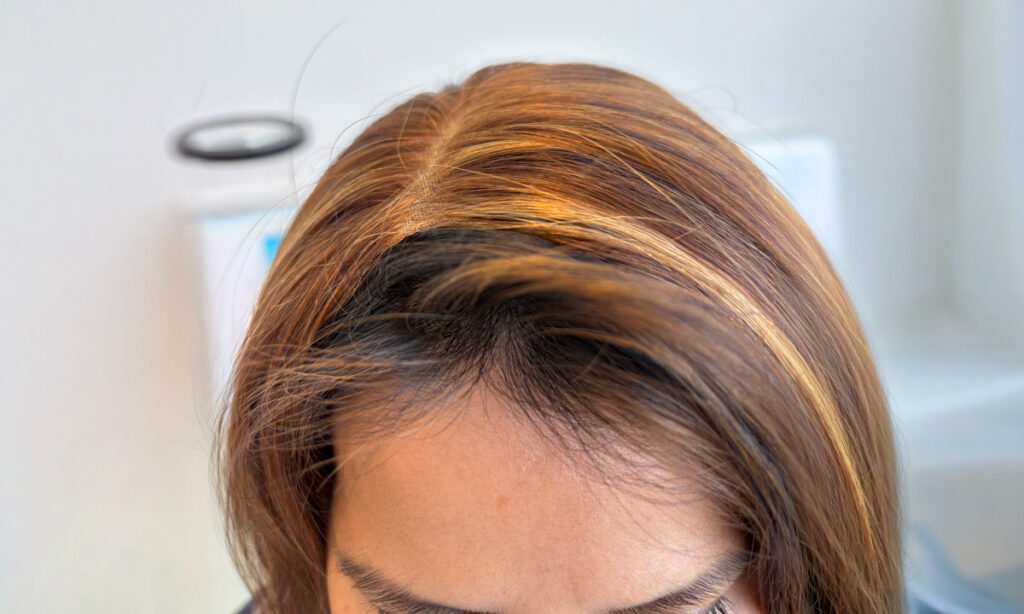 Woman wearing poorly blended topper